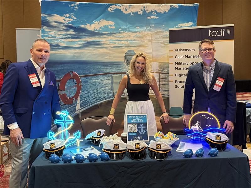 Michael Gibeault, Connie Smith, and Andy Cosgrove at TCDI's table during ACC S. Florida's Annual CLE Conference
