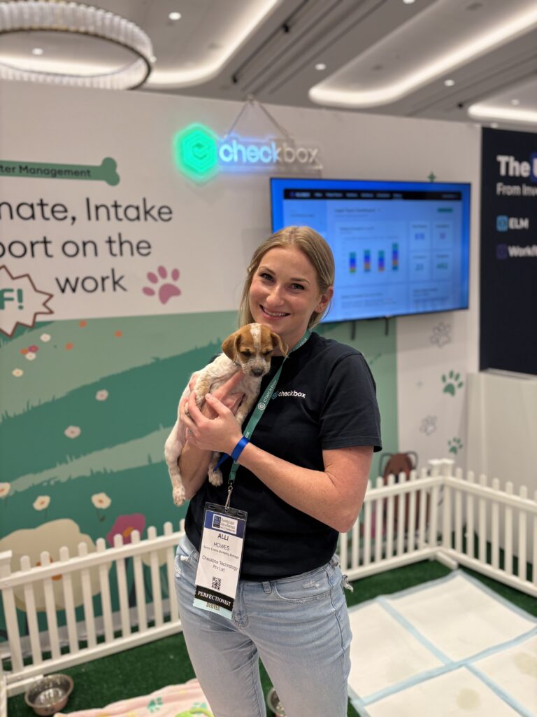 Running Legal Like a Business 2025 - Puppies for Adoption at Checkbox Technology Booth