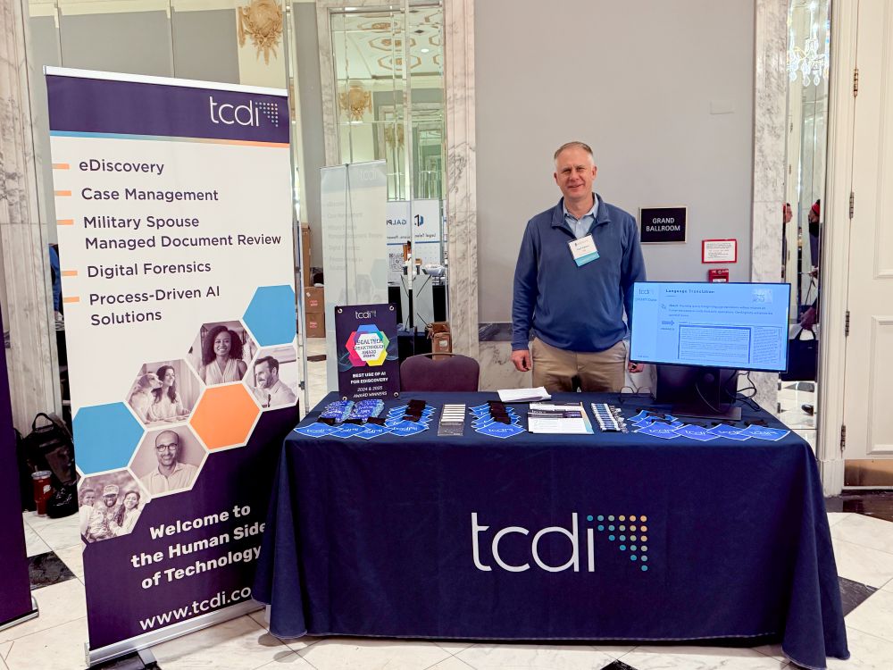 Ned Adams at TCDI's table for Georgetown AEDI 2025